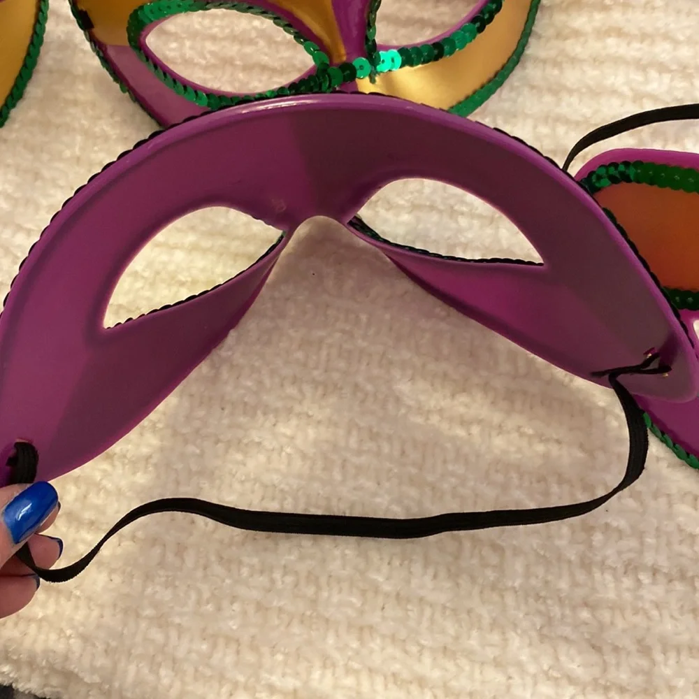 Set of 7 Mardi Gras Masks! Hard plastic purple masks. Very hearty and will last!